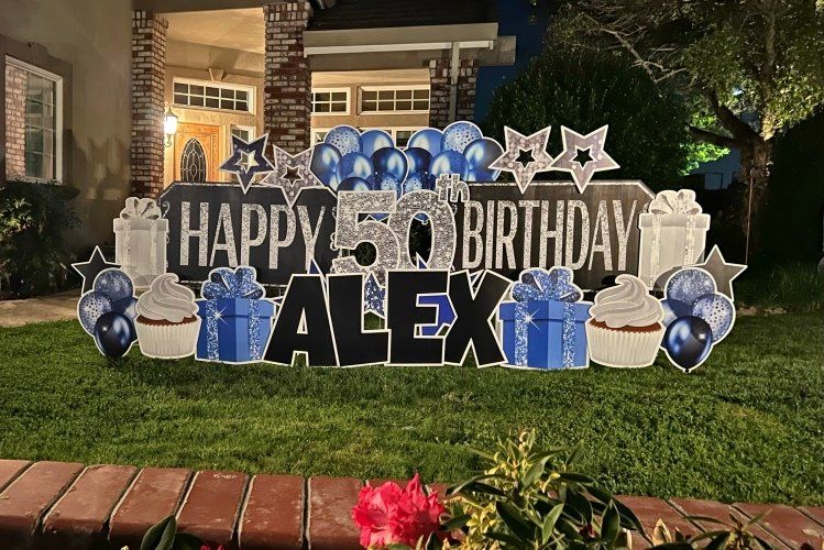 Birthday yard card in silver and black. 