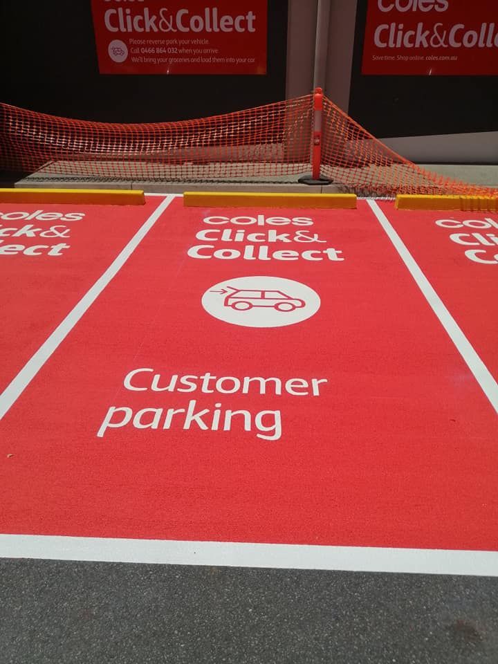 A Red and White Parking Lot that Says Customer Parking — Semrau Constructions In Bentley Park, QLD