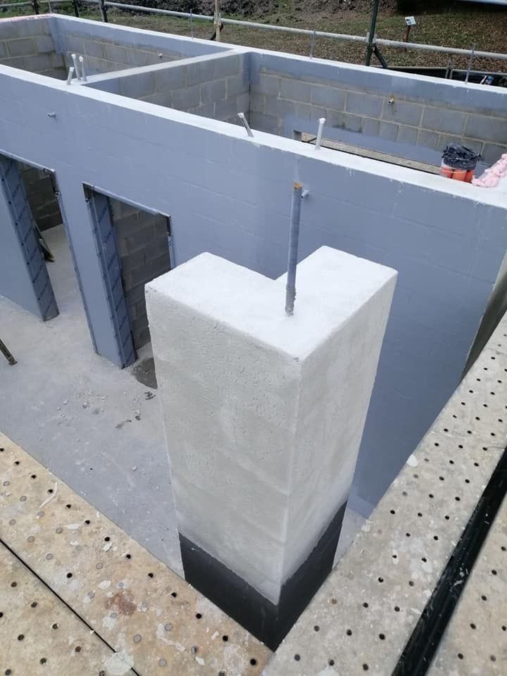 A Bathroom with A Wooden Wall and A Sink — Semrau Constructions In Bentley Park, QLD