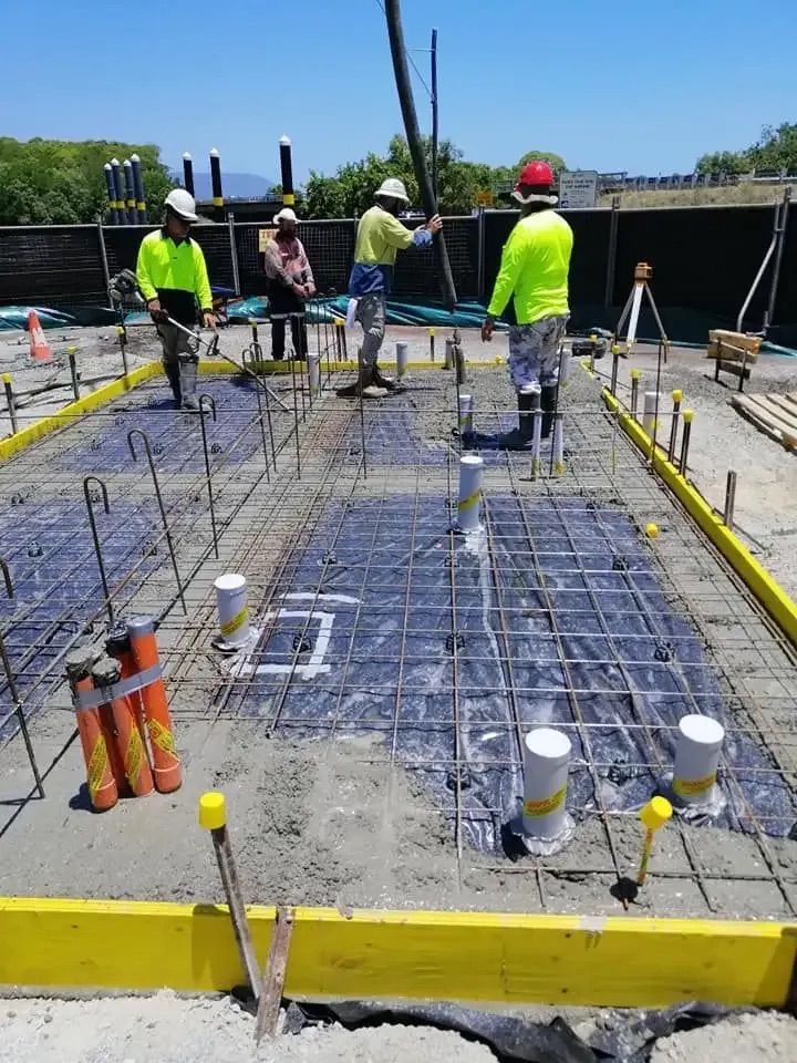 Men Prepping for Concrete slab
