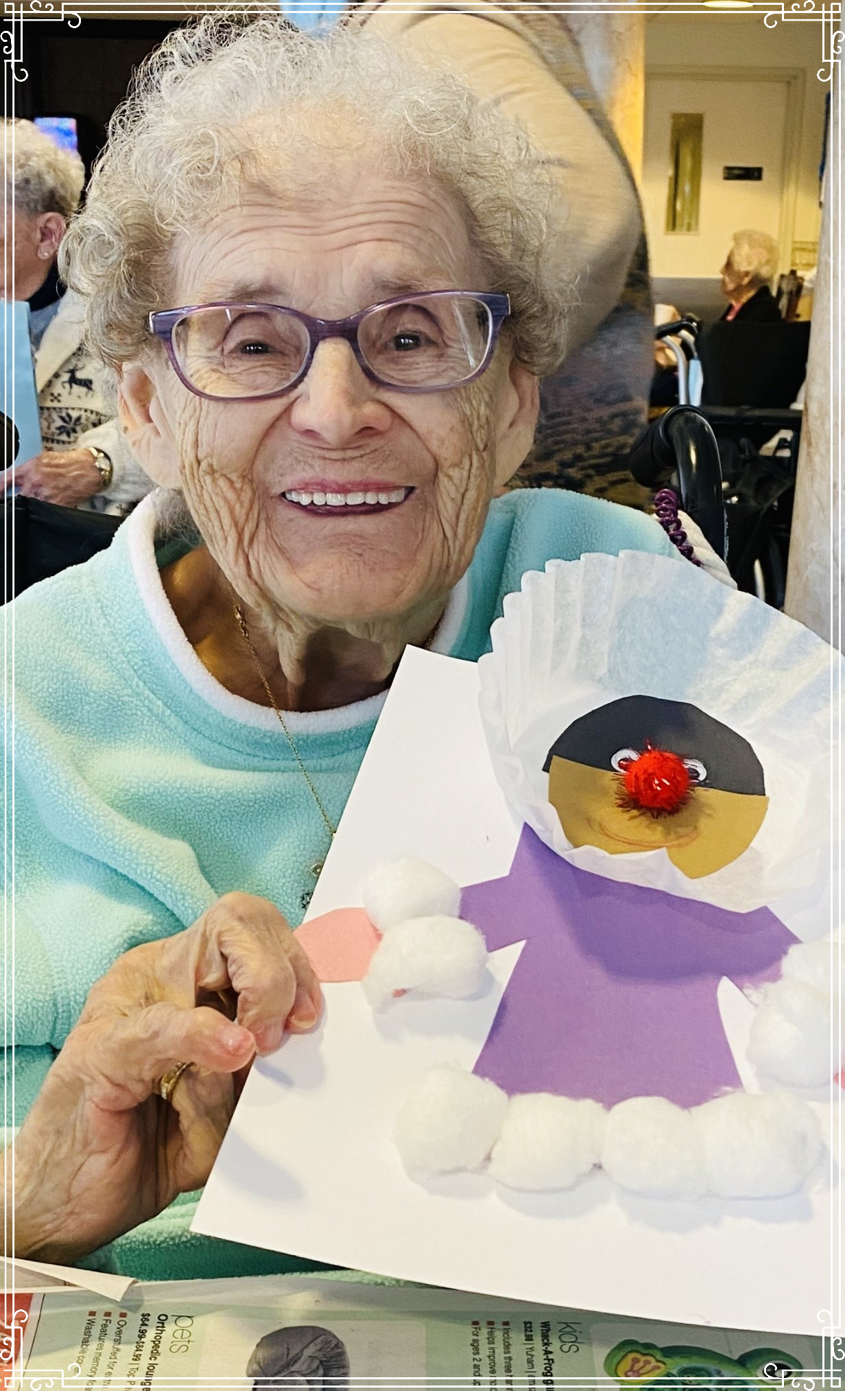 A Senior Showing Her Painting — Hazleton, PA — Laurels Senior Living Community