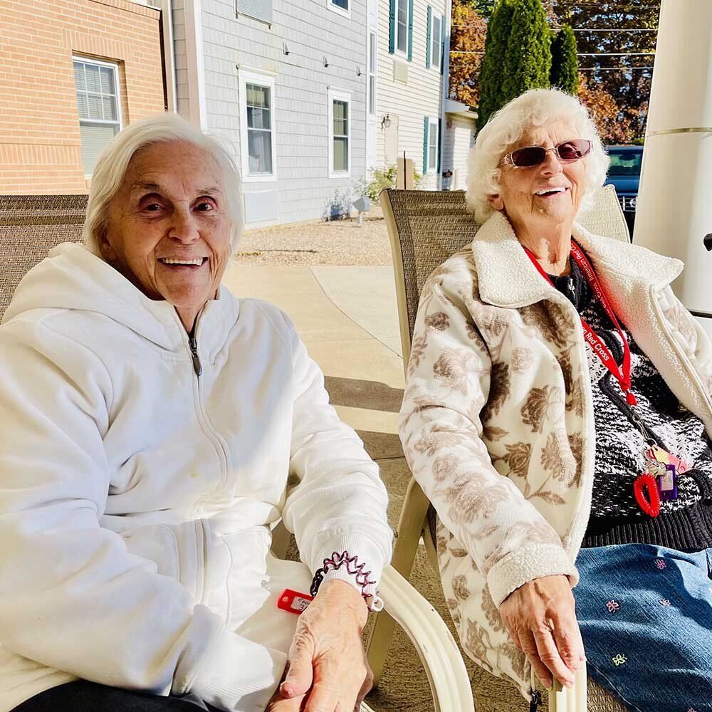 Seniors Sitting And Relaxing Outside — Hazleton, PA — Laurels Senior Living Community