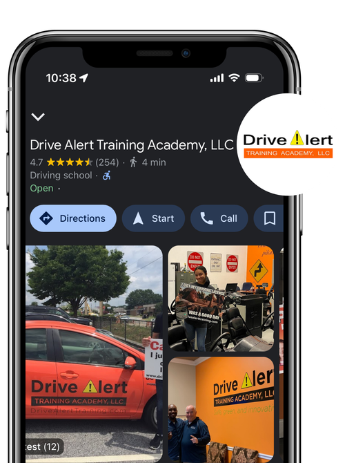 A phone with a drive alert training academy app on it.