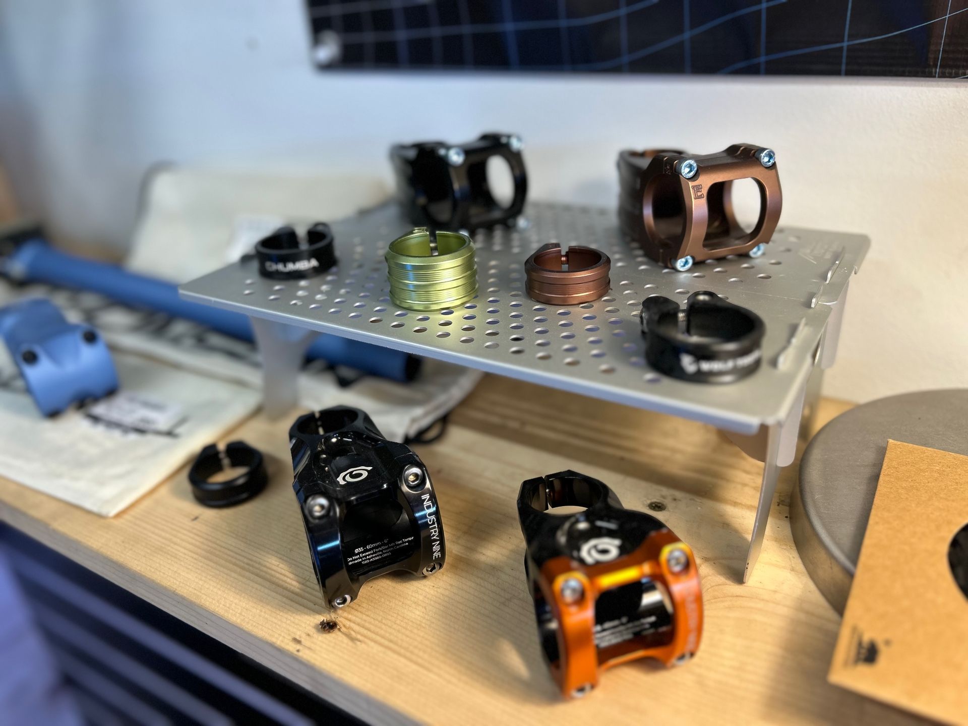 A table with a bunch of bicycle parts on it