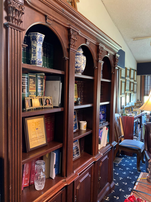Wood Cabinet With Law Books — East Alton, IL — Law Office of Susan F. Grammer