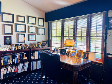Attorney's Desk With Family Pictures — East Alton, IL — Law Office of Susan F. Grammer