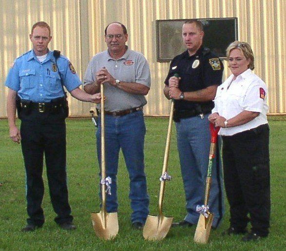 three men  and a golden shovel