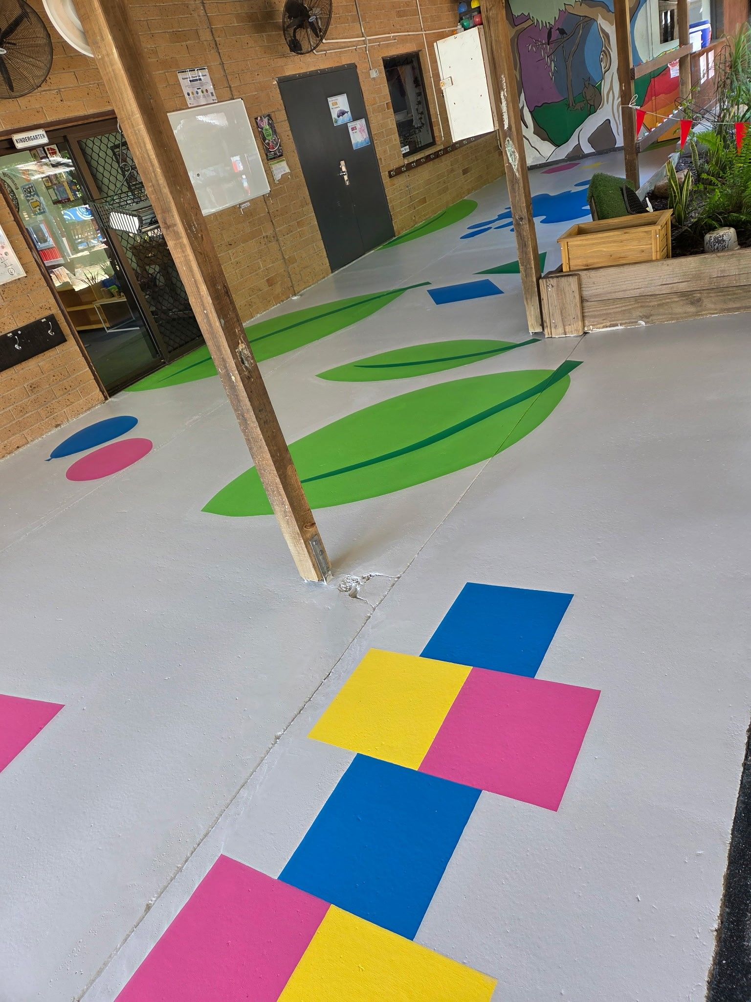 Outdoor Floor Painted With Bright Hopscotch Squares — Priority Painters in Gladstone Central, QLD