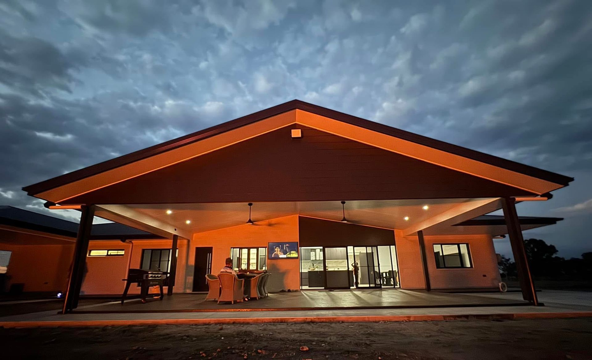 A Wide, Modern Home With a Large, Lit Patio — Priority Painters in Gladstone Central, QLD