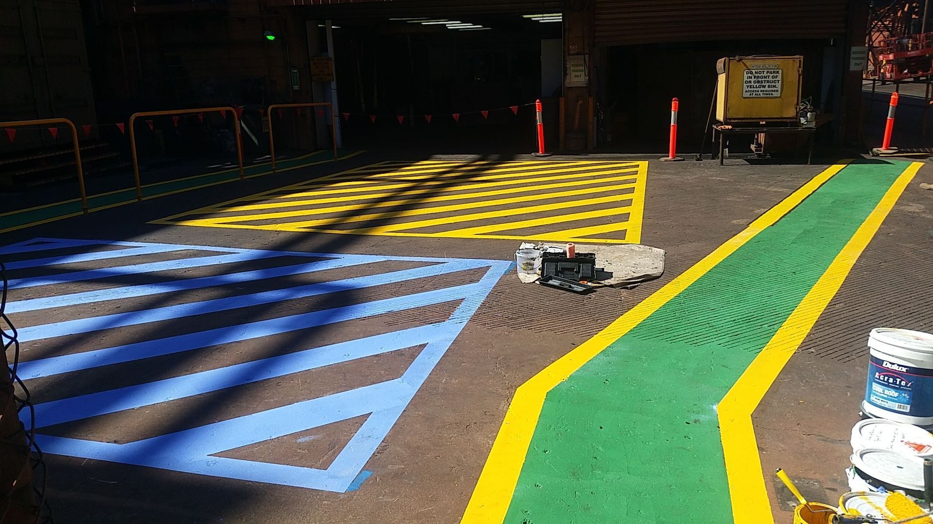 Freshly Painted Yellow, Blue, and Green Pavement Markings — Priority Painters in Gladstone Central, QLD