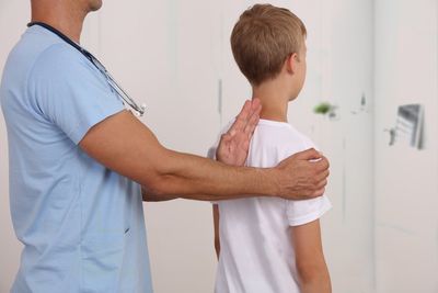 Young Boy Having Back Adjustment — Robstown, TX — Five Points Chiropractic Clinic
