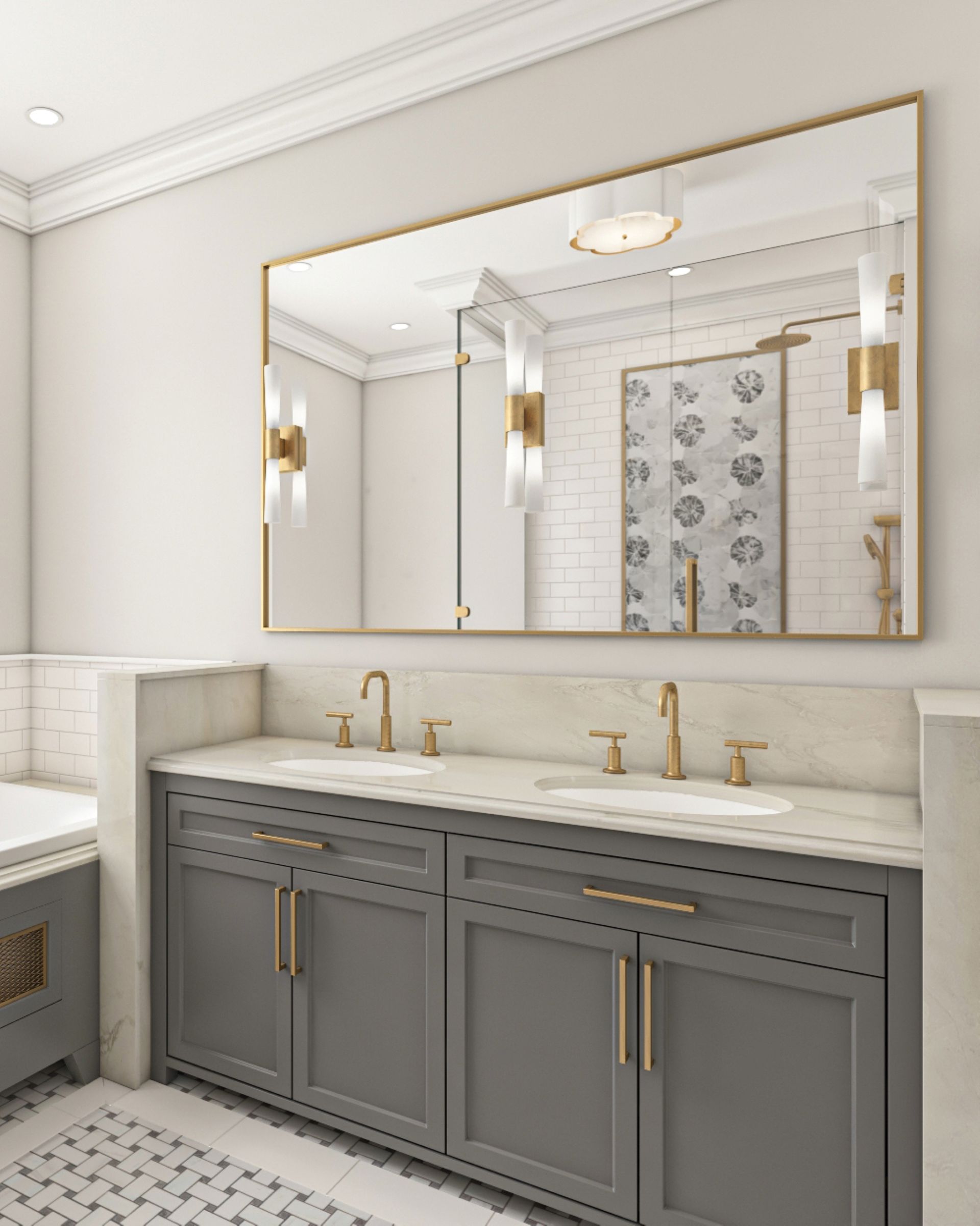 Gray vanity with gold fixtures in a modern white bathroom; large mirror reflects shower.