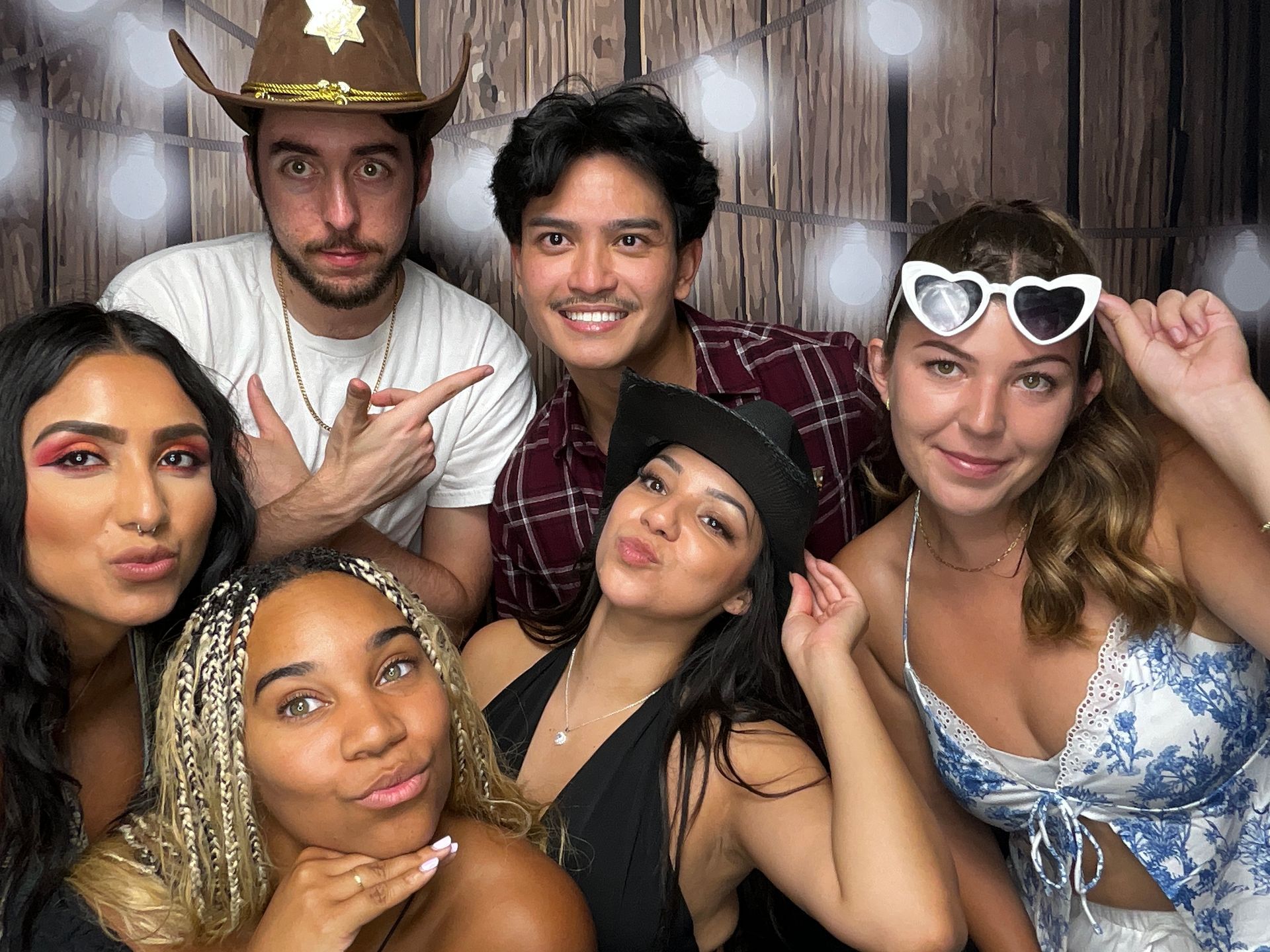 A group of people are posing for a picture together.