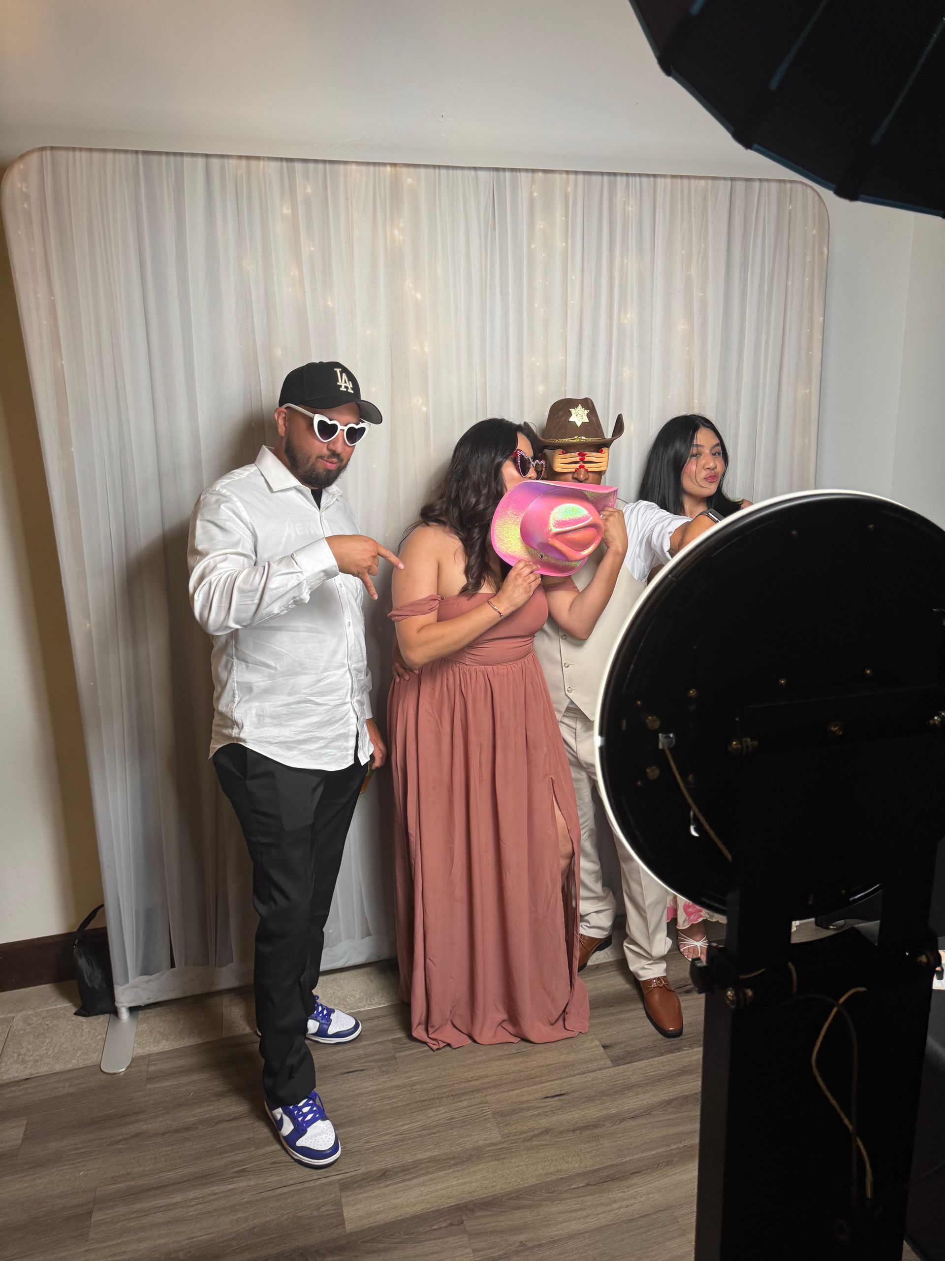 Guests enjoying the Brightlight Photo Booth at Wedgewood Weddings Fallbrook in Fallbrook, California