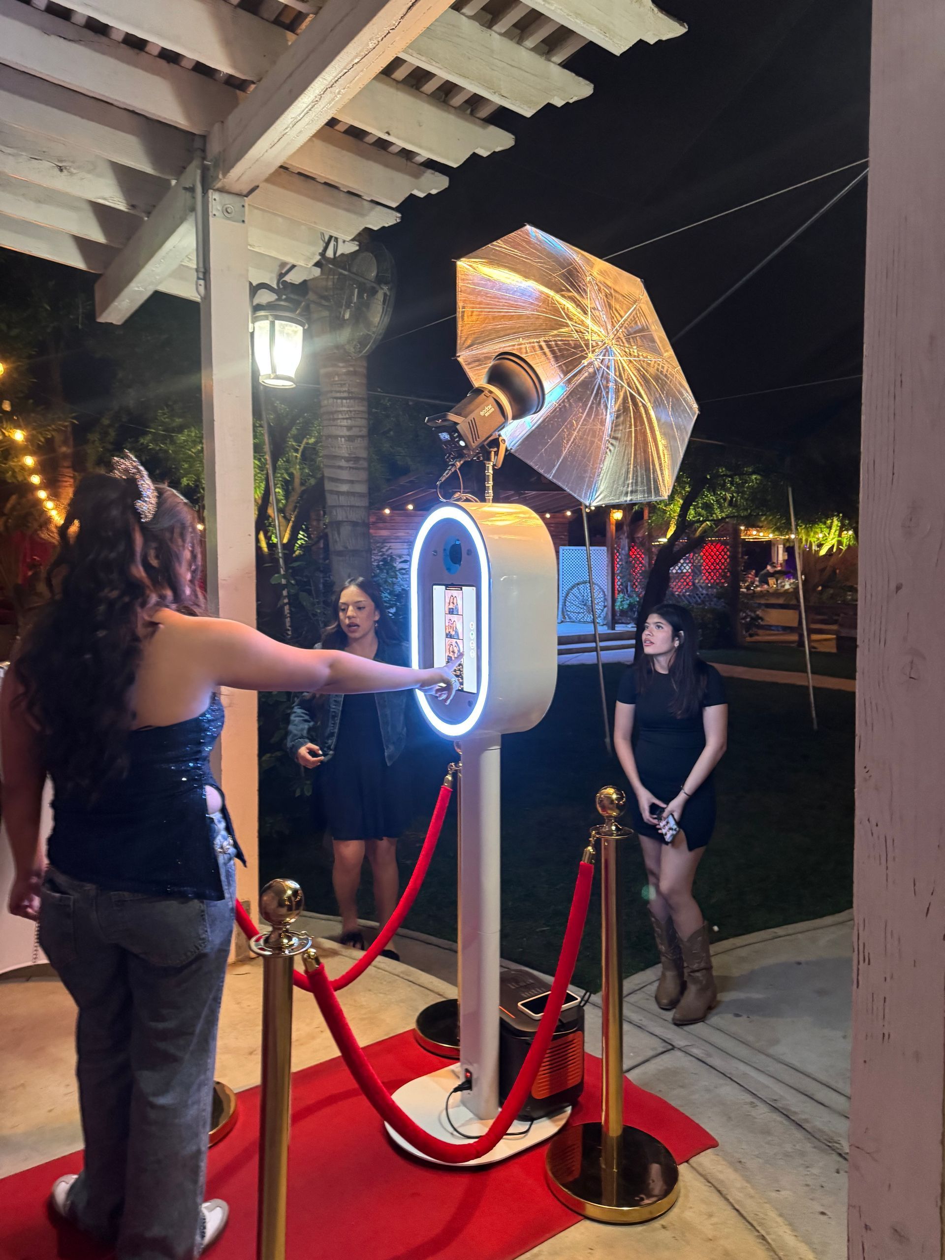 Wedding guests enjoying a luxury photo booth experience