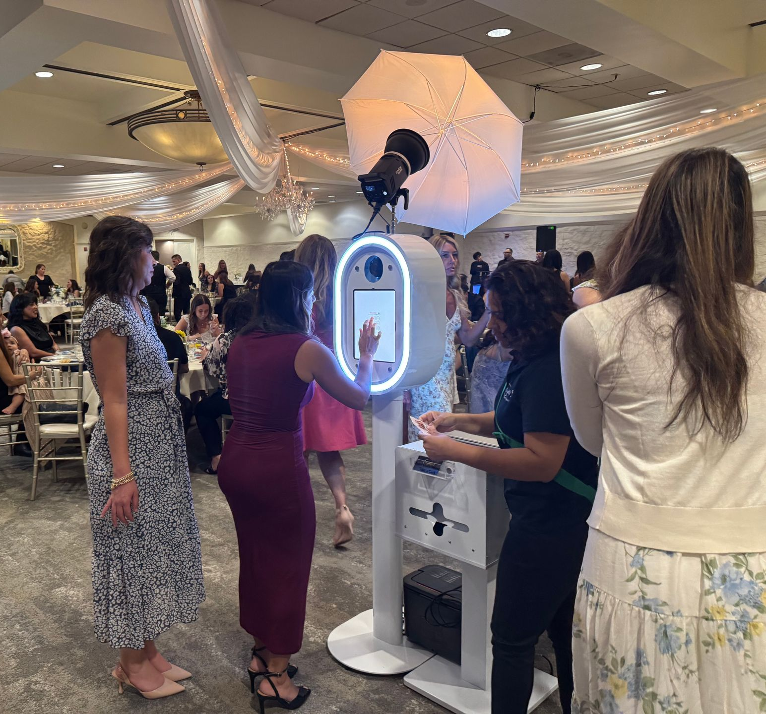 Photo booth strips from Brianna's Quinceañera: people posing, pink theme, dress graphic, date.