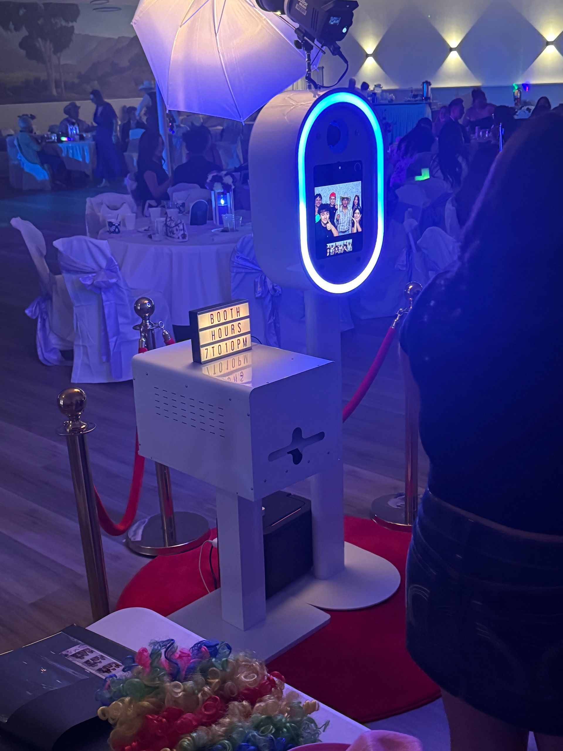 Luxury photo booth setup with red carpet experience and instant prints