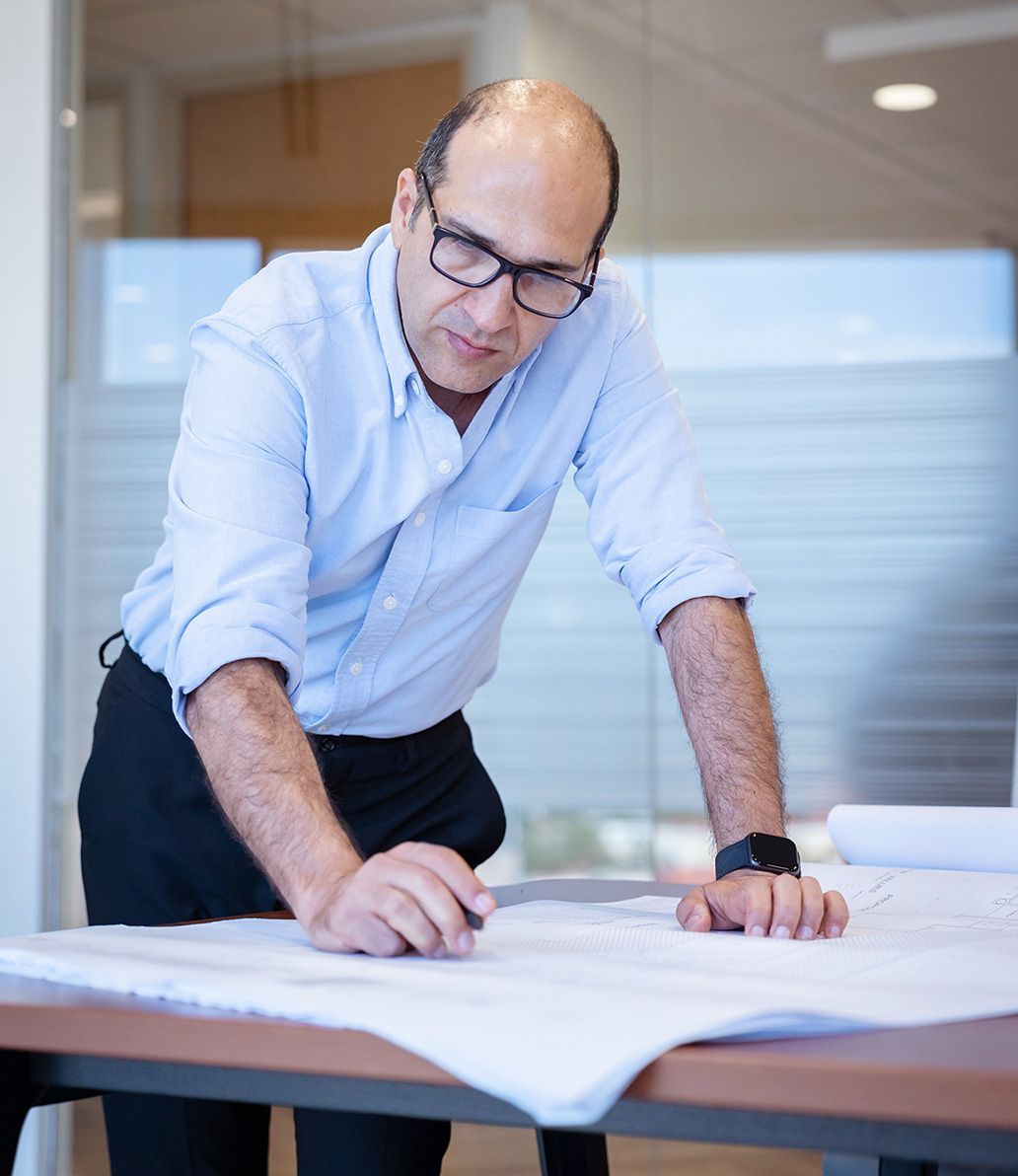 Mehdi Momen Reviewing plans 