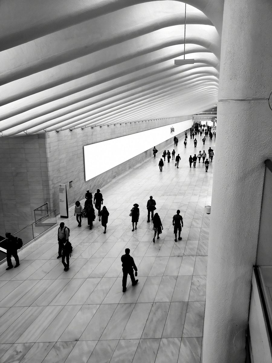 People walking in a hallway