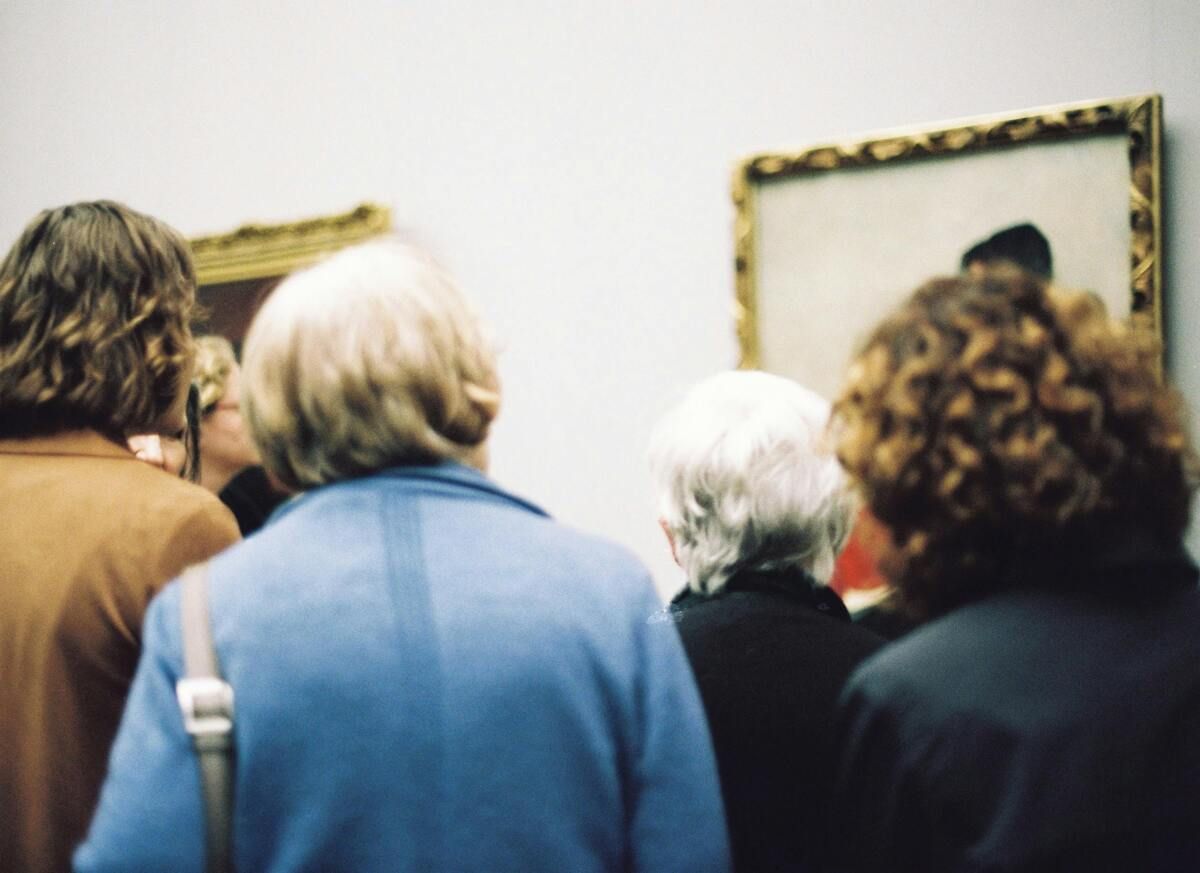  A crowd staring on a contemporary art