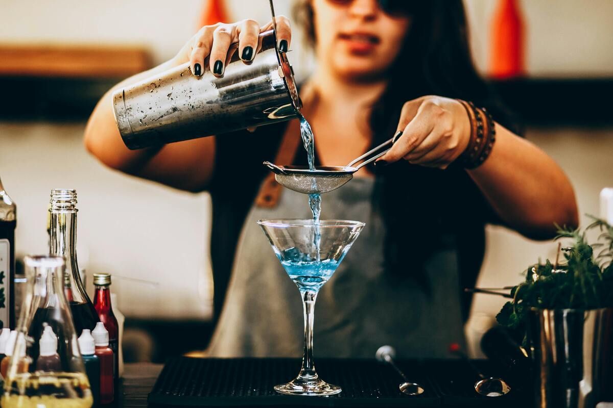 A bartender preparing a drink