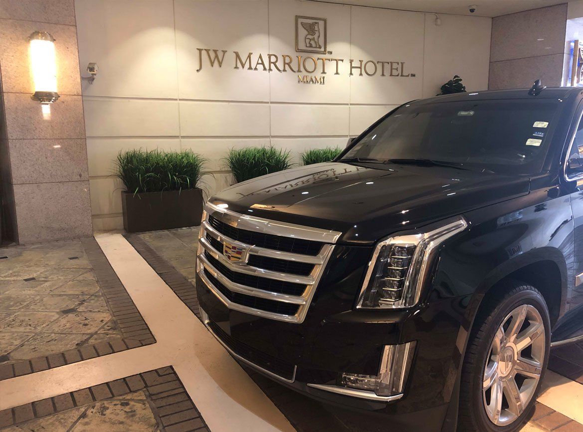 A black luxury car inside the JW Marriott Hotel