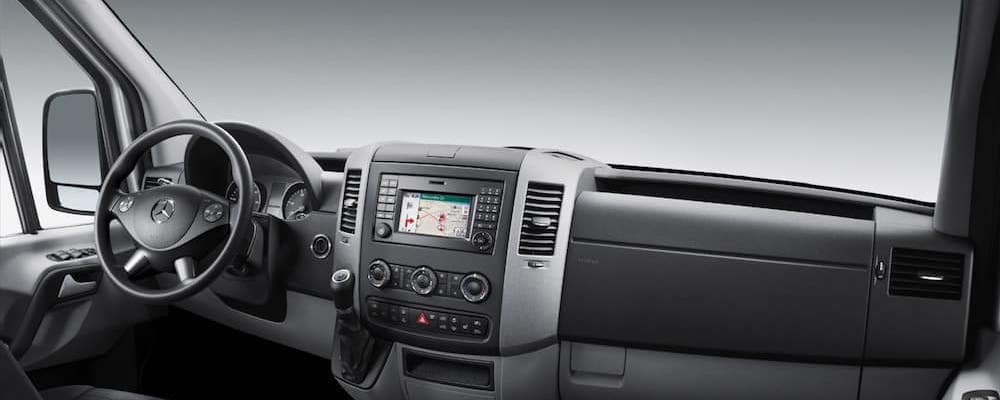 A black and white photo of the interior of a van.