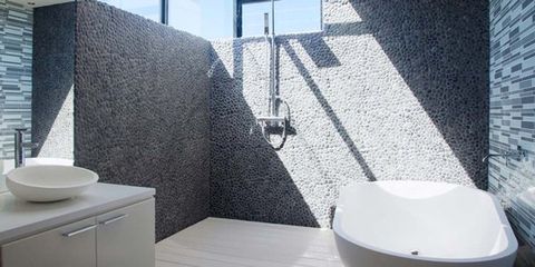 modern stone and tile bathroom