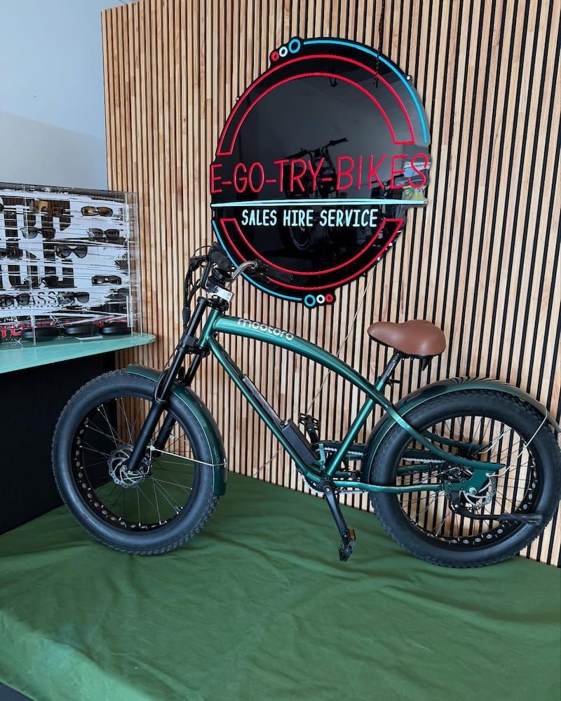 Green E-bike Displayed in a Shop — E-Go-Try-Bikes in Nelson Bay, NSW