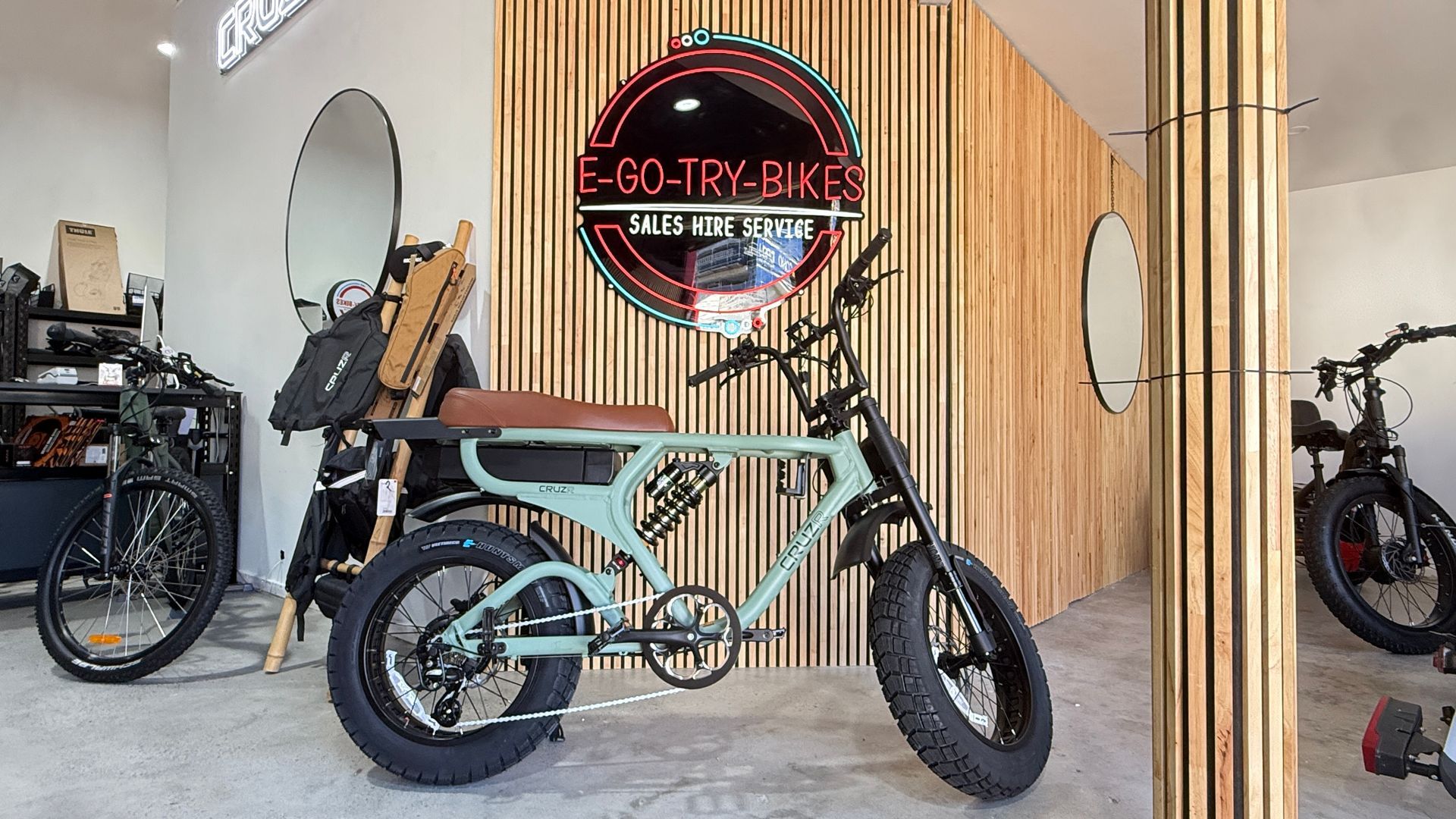Green E-bike Displayed in a Shop — E-Go-Try-Bikes in Nelson Bay, NSW