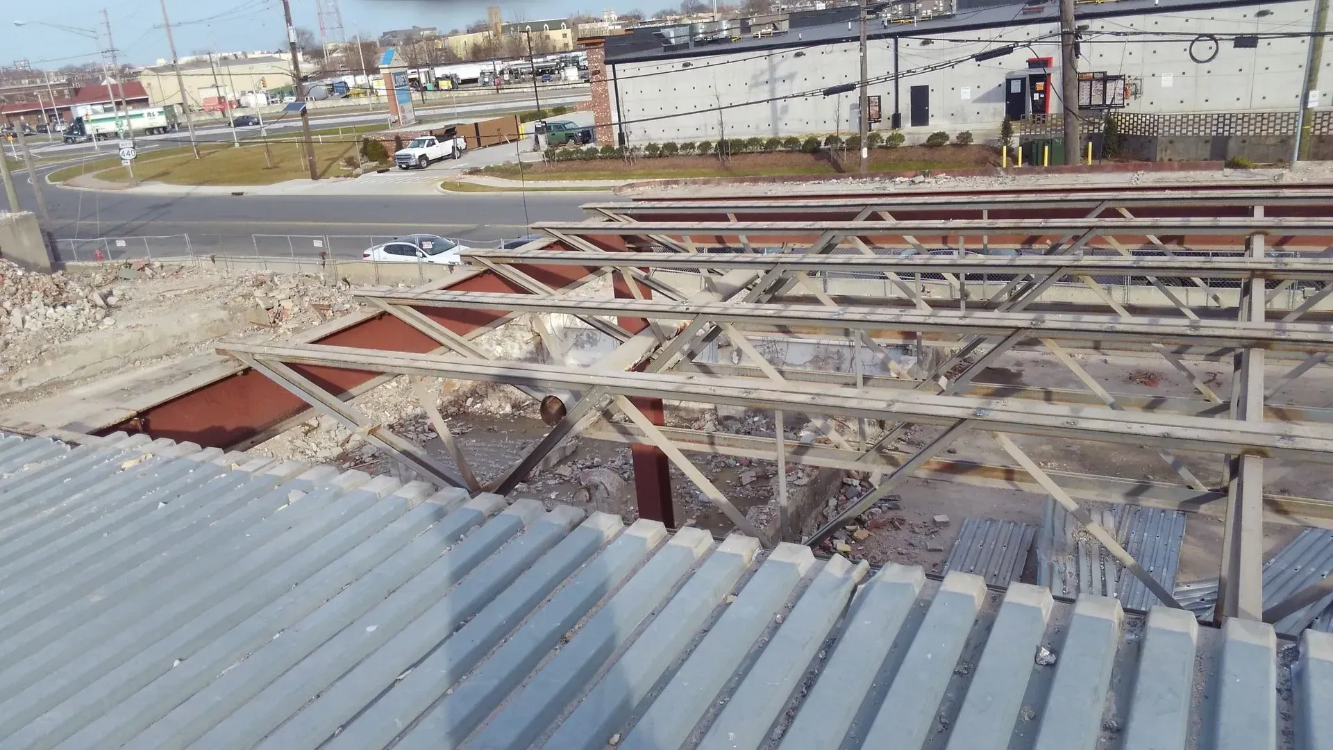 The roof of a building is being demolished.