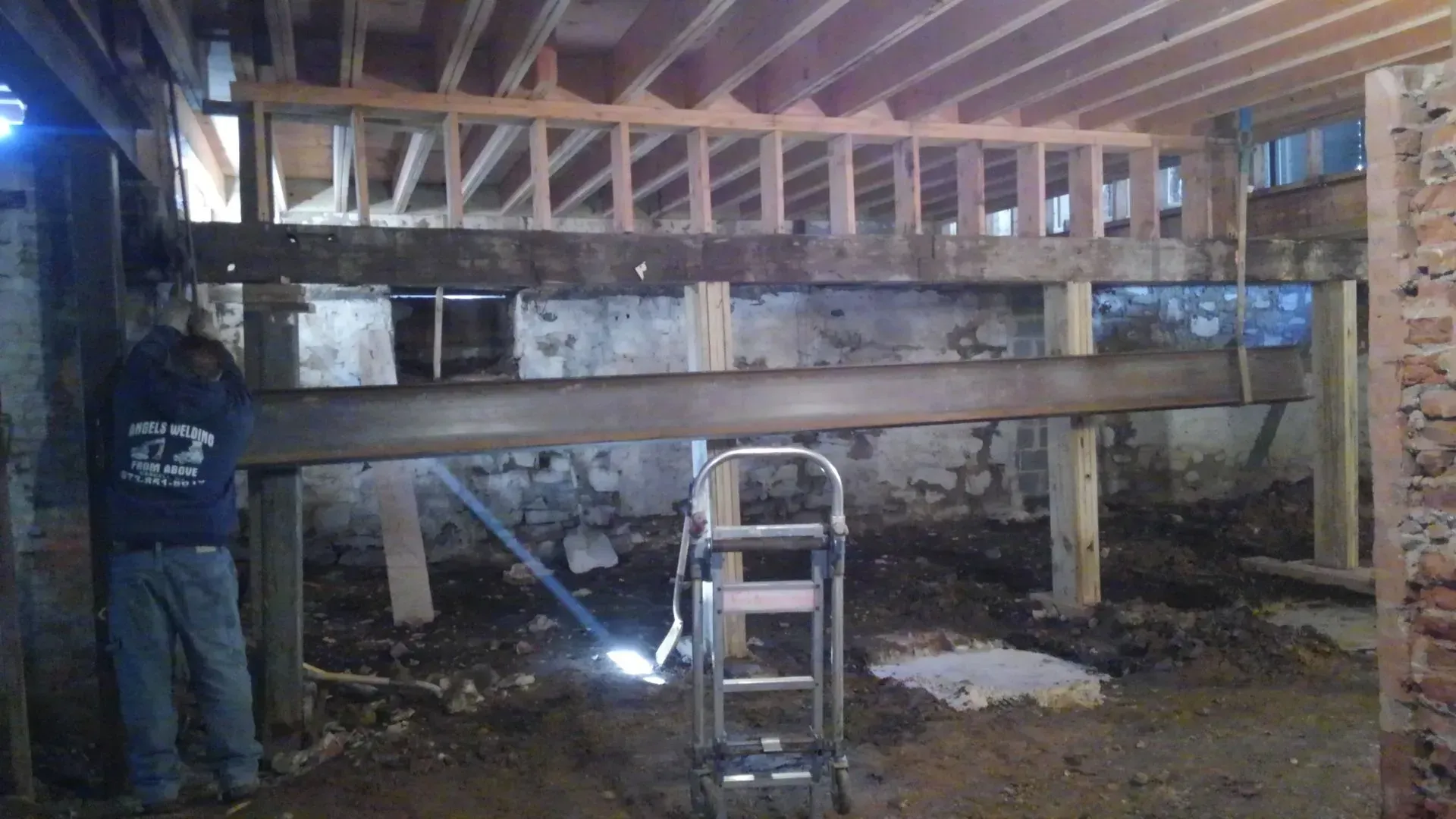 A man wearing a blue shirt with the number 42 on it.