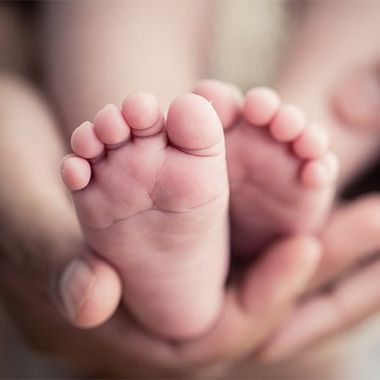 Baby's Feet in Mother's Hand — Jackson, MS — Capital City Children & Adolescent Clinic, PLLC