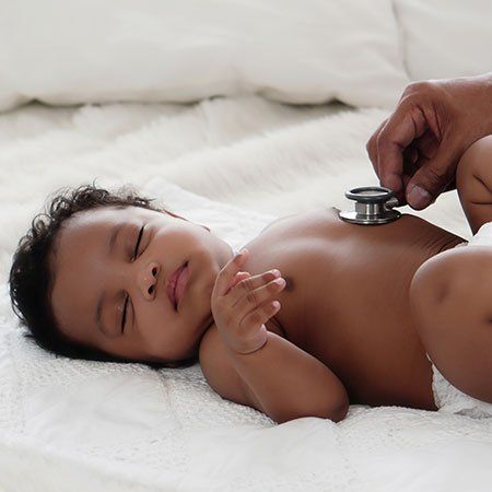 African American Baby Girl Being Health Checkup — Jackson, MS — Capital City Children & Adolescent Clinic, PLLC