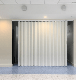 Bed in Room with Folding Walls — Miami, FL — Folding Walls Of Miami Inc