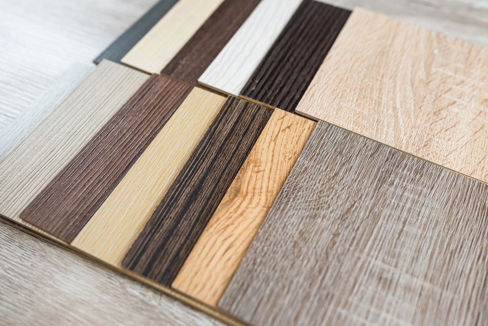 Samples of various wood flooring colors and textures.