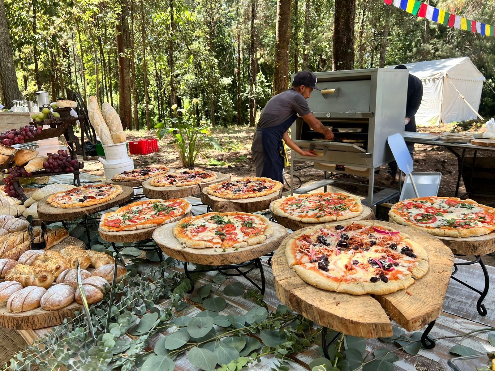 A sunset over a mountain range with a lot of fog