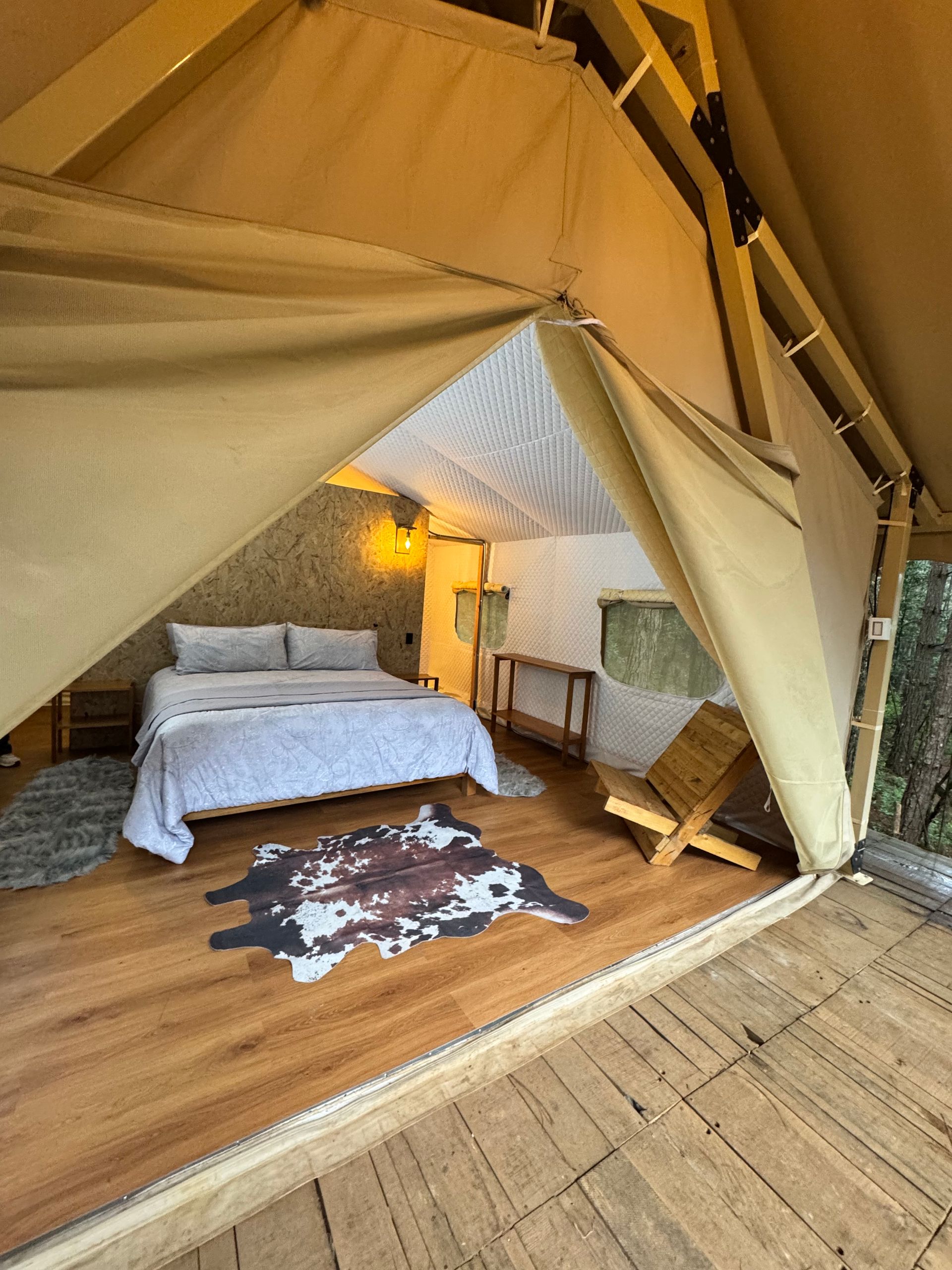 A sunset over a mountain range with a lot of fog