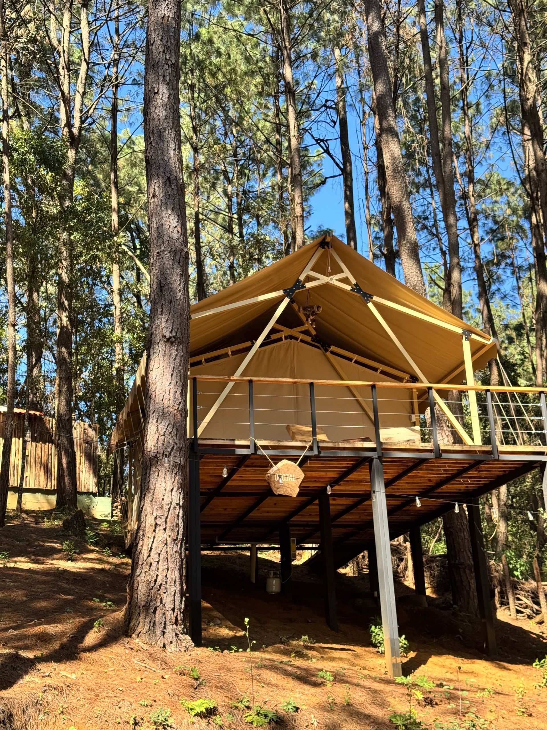A sunset over a mountain range with a lot of fog