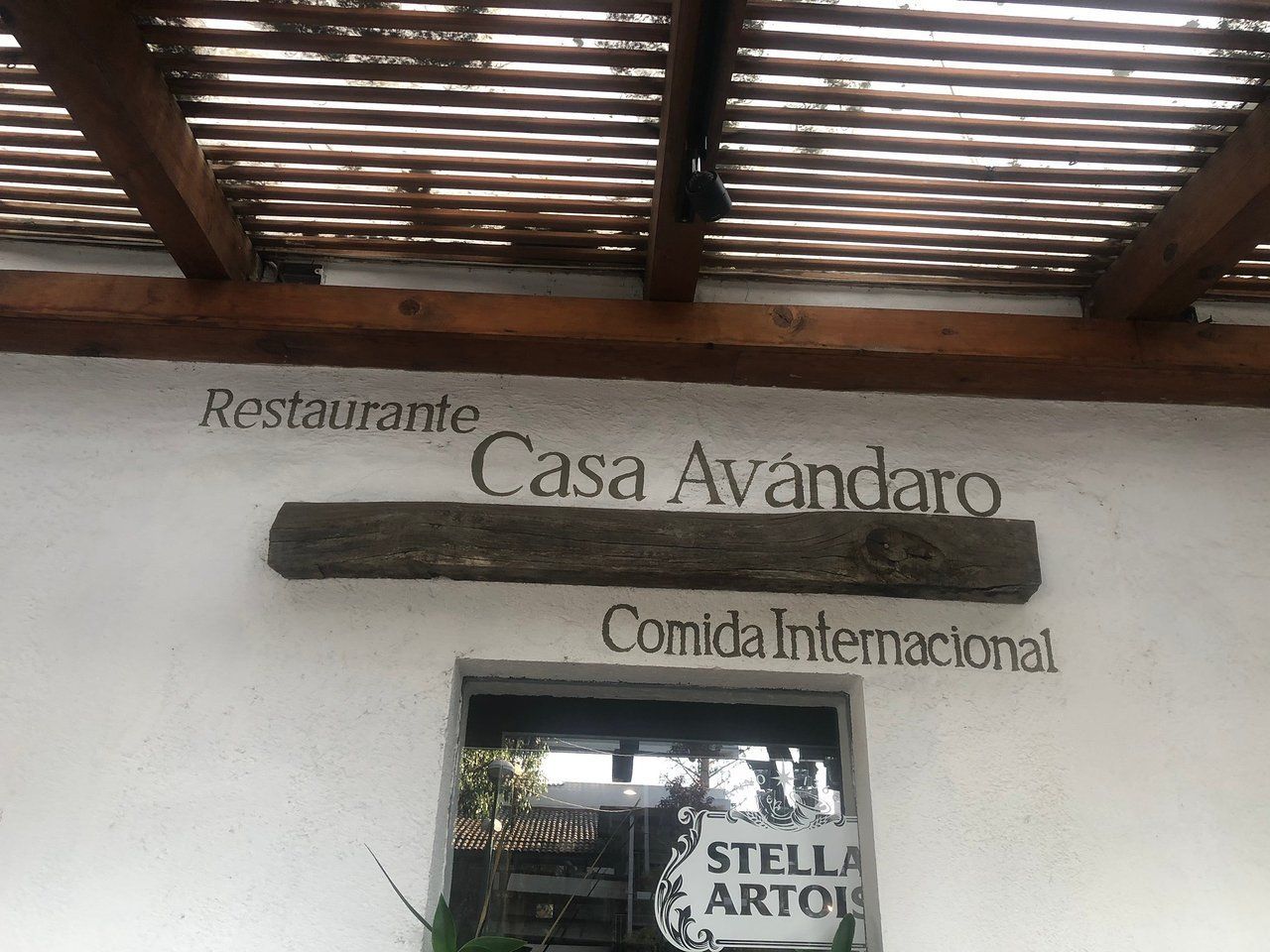 A sunset over a mountain range with a lot of fog