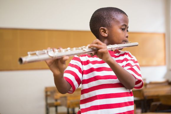 Boy Playing the Flute — Louisville, KY — Rising Stars Music Academy