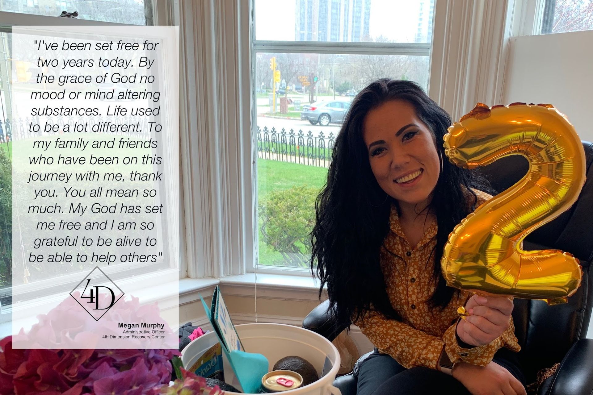 Woman holding a gold “2” balloon, smiling. Text overlay reads, 