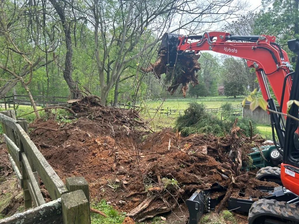 excavator digging ground for new septic in St Mary's Couty