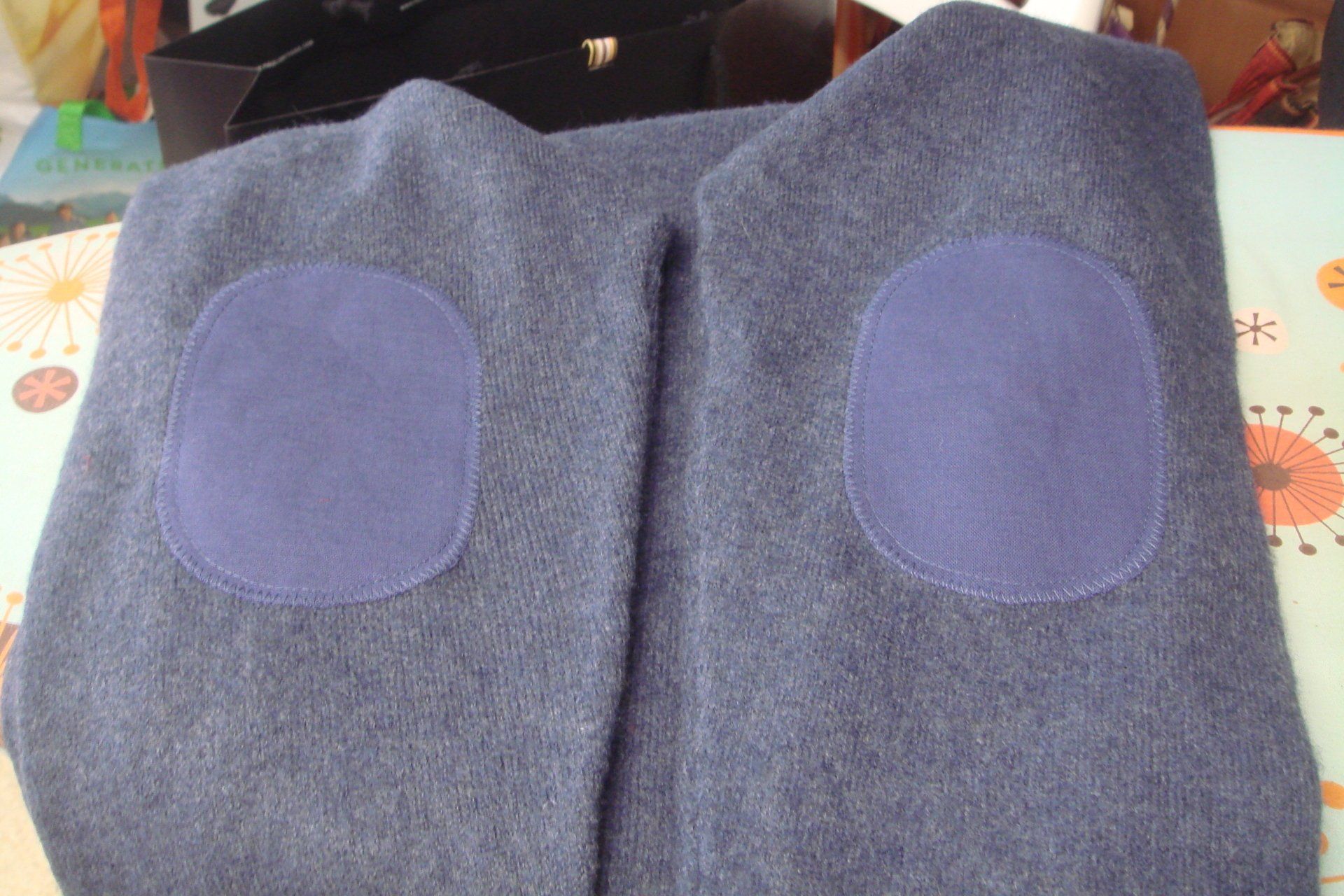 Ajout patchs veste GKhan couture Lausanne