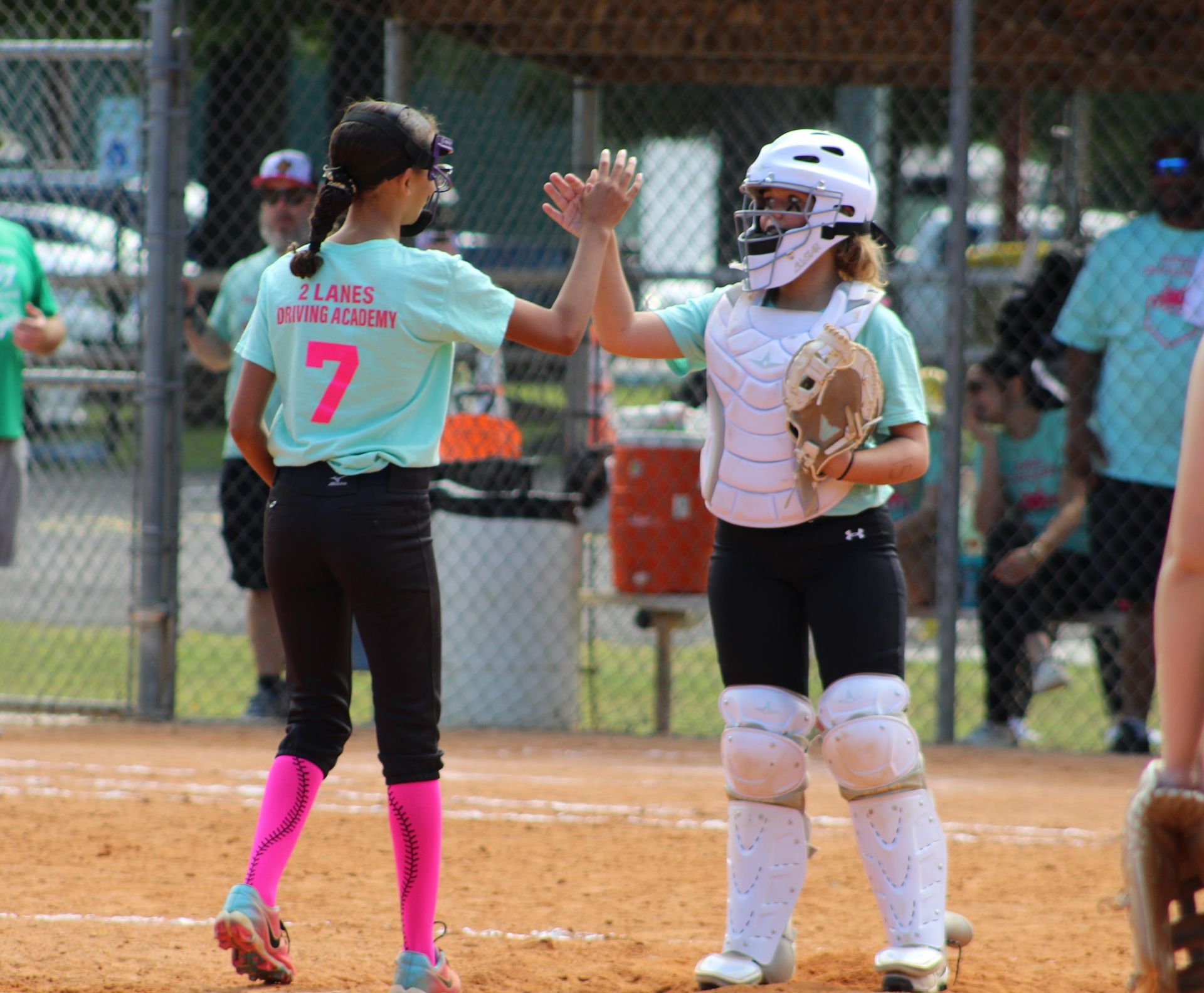 Baseball on a dark surface, with visible stitching.