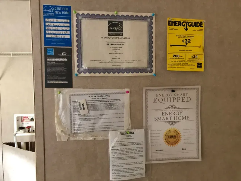 A wall with a certificate that says equipped on it
