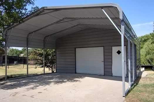 A garage with a canopy over it and a door.