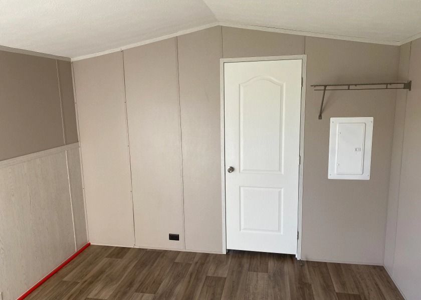 There is a door in the middle of the room.