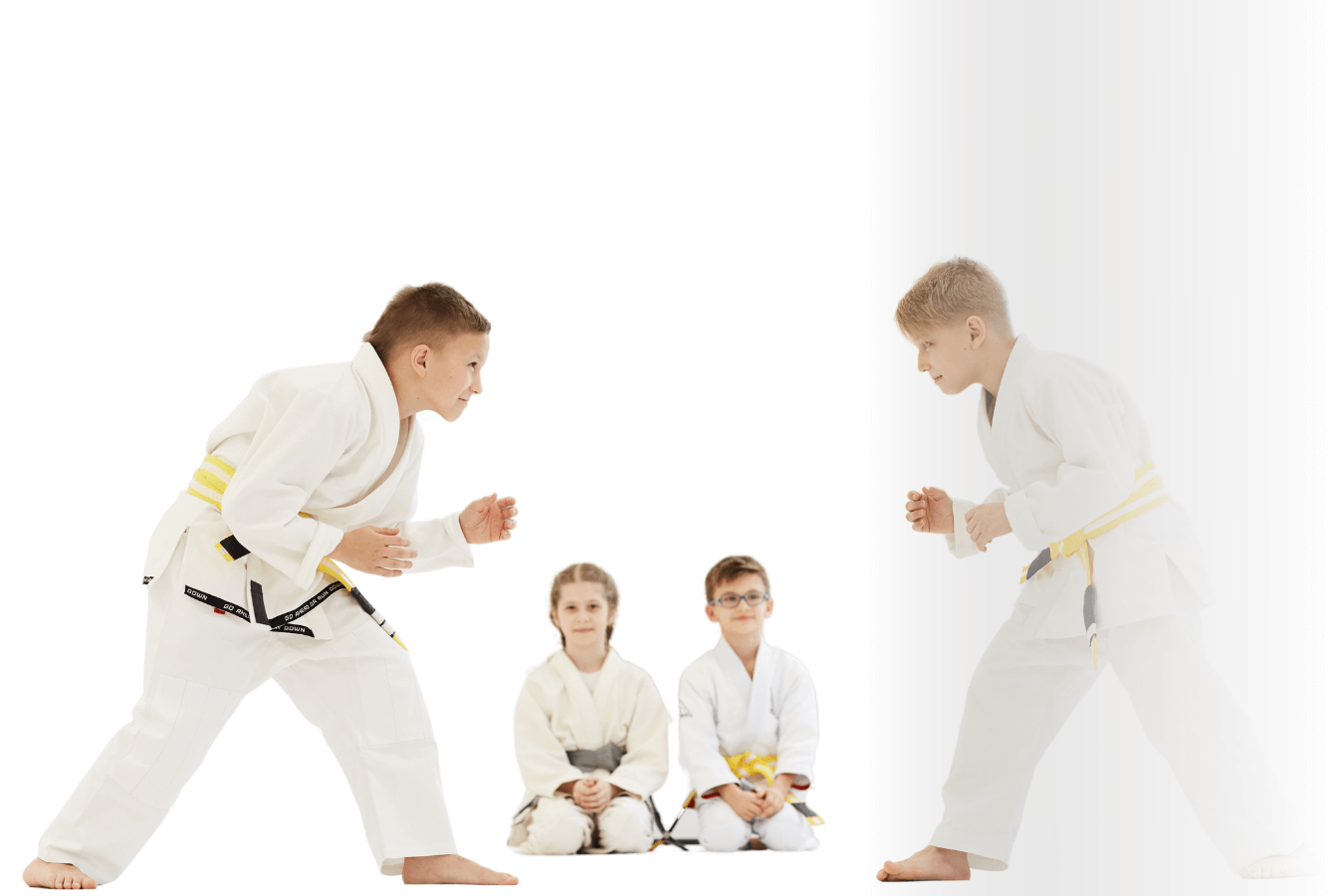 Families practice Jiu Jitsu drills at Roberts Family Mixed Martial Arts in Orange, MA.