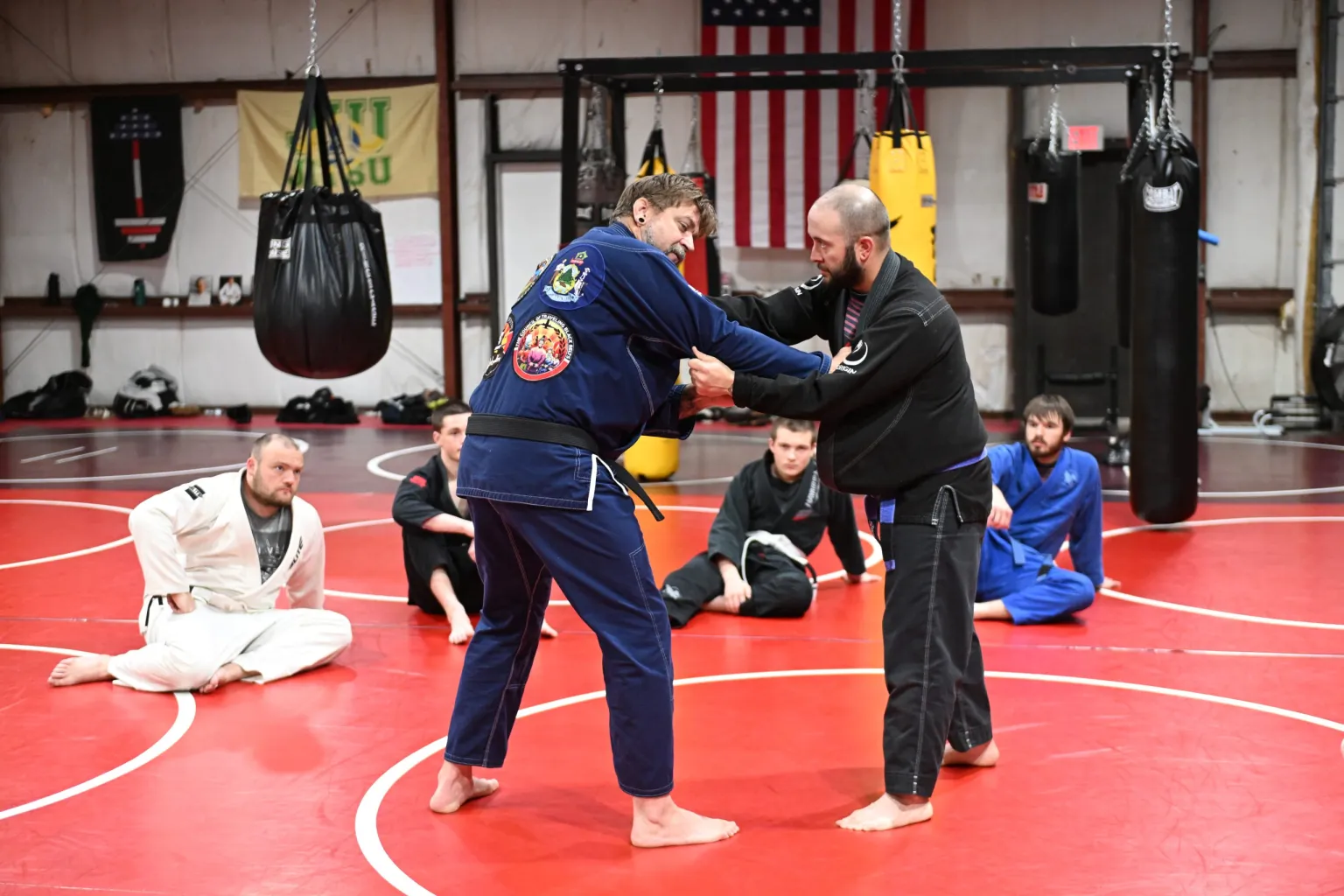 Students training striking drills at Roberts Family Mixed Martial Arts in Orange, MA, building discipline and respect.